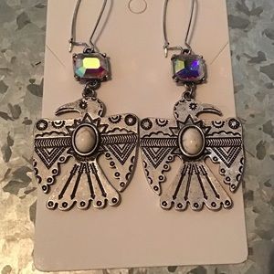 Thunderbird Southwest style silver with stones dangle earring.